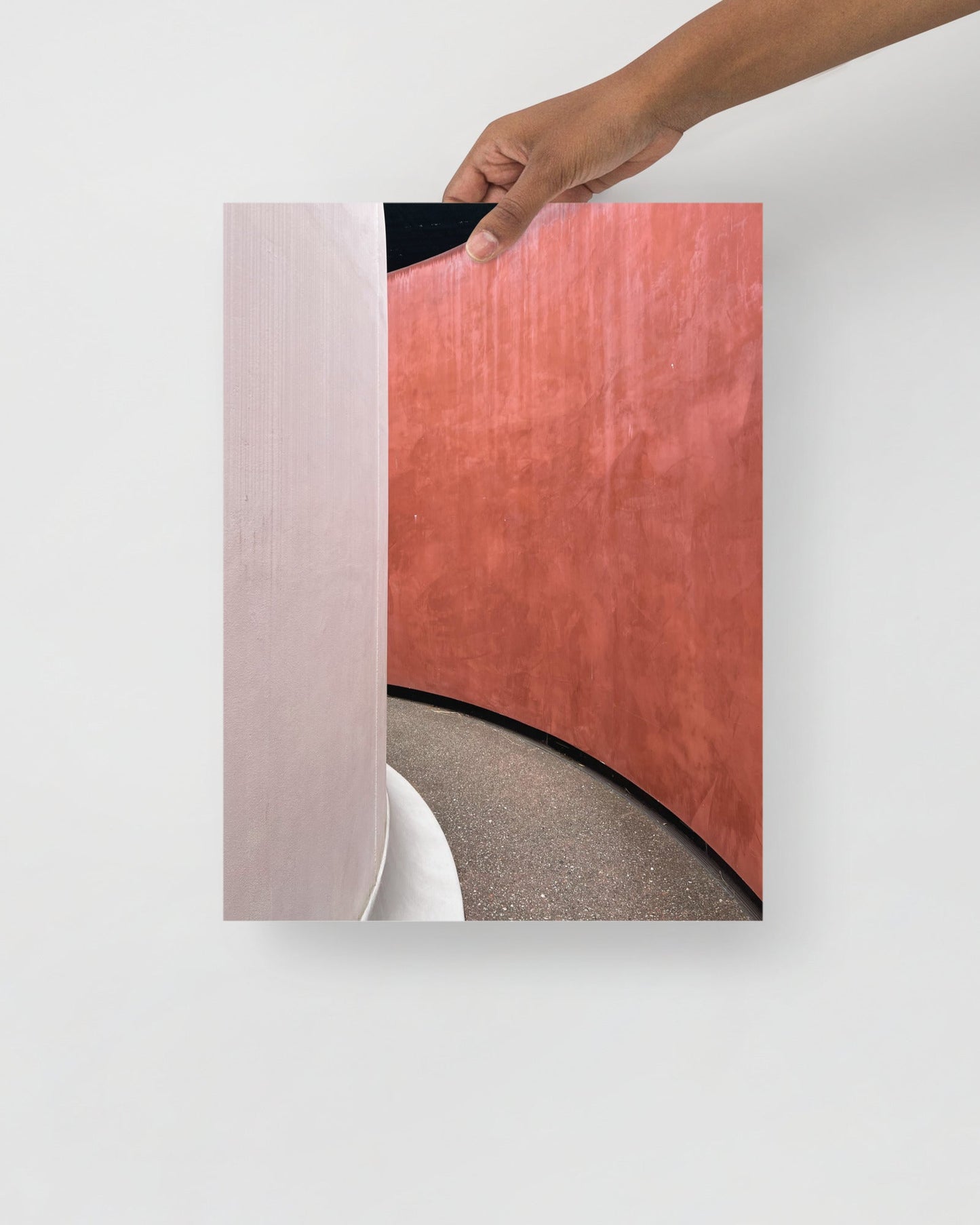Abstract photography print of 'Three Gems by James Turrell' with a hand holding a corner of it on a white background