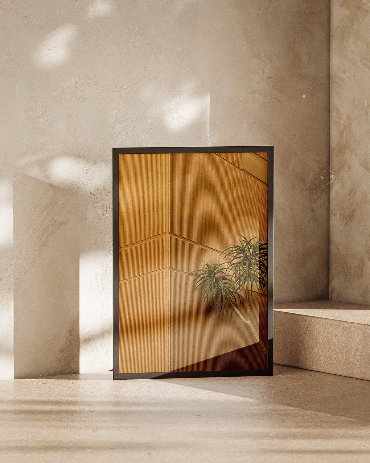 Modern interior with a glass door featuring a plant design, set against a neutral wall.