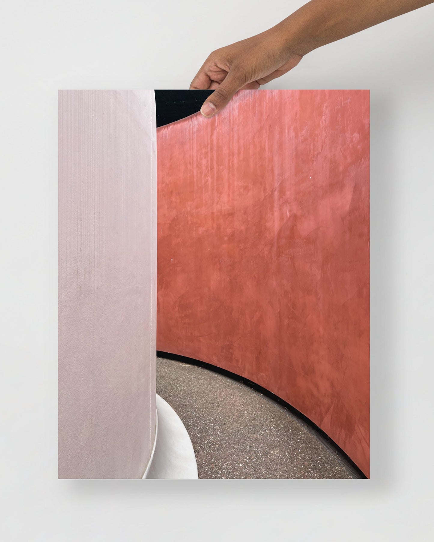 Abstract photography print of 'Three Gems by James Turrell' with a hand holding a corner of it on a white background