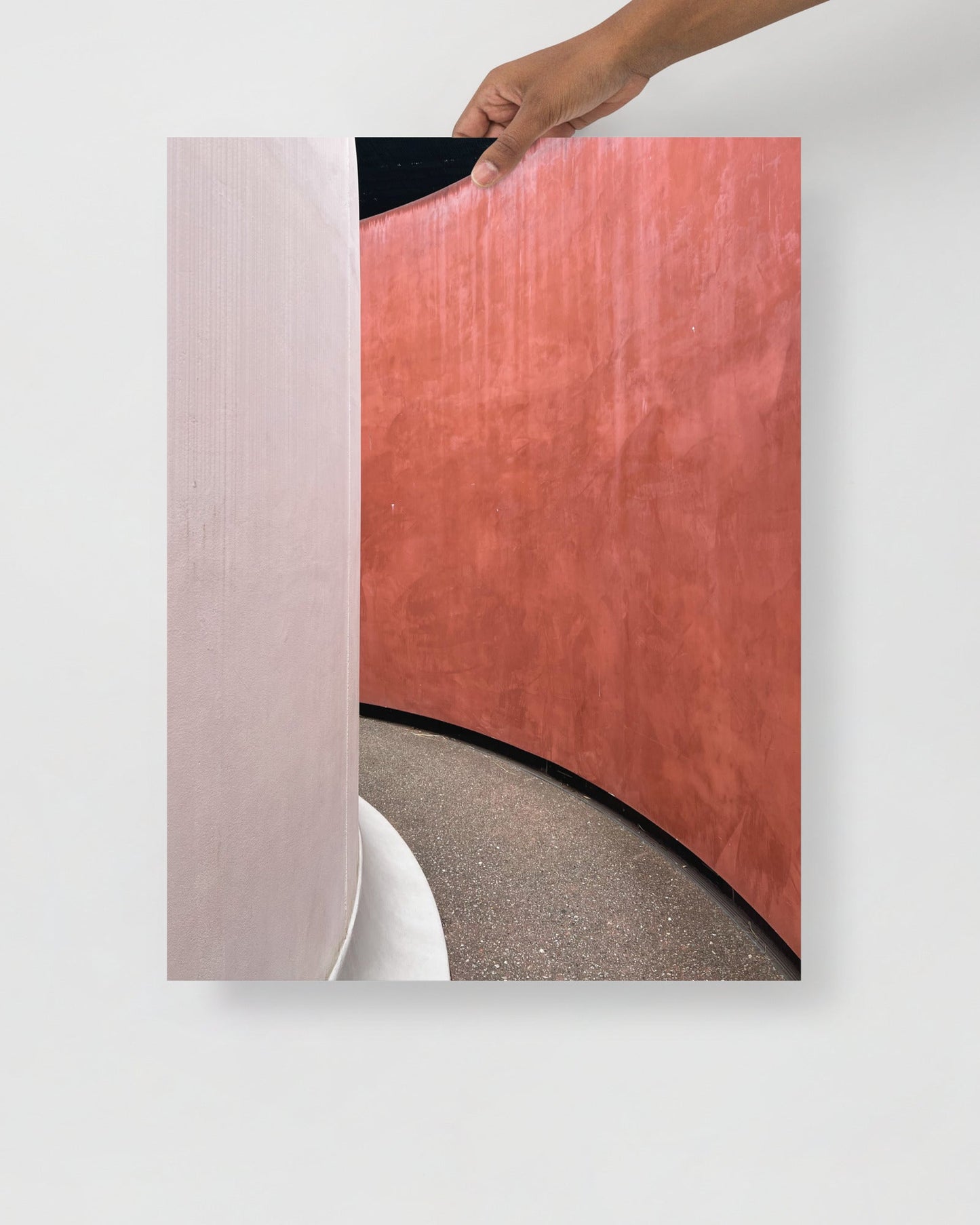 Abstract photography print of 'Three Gems by James Turrell' with a hand holding a corner of it on a white background