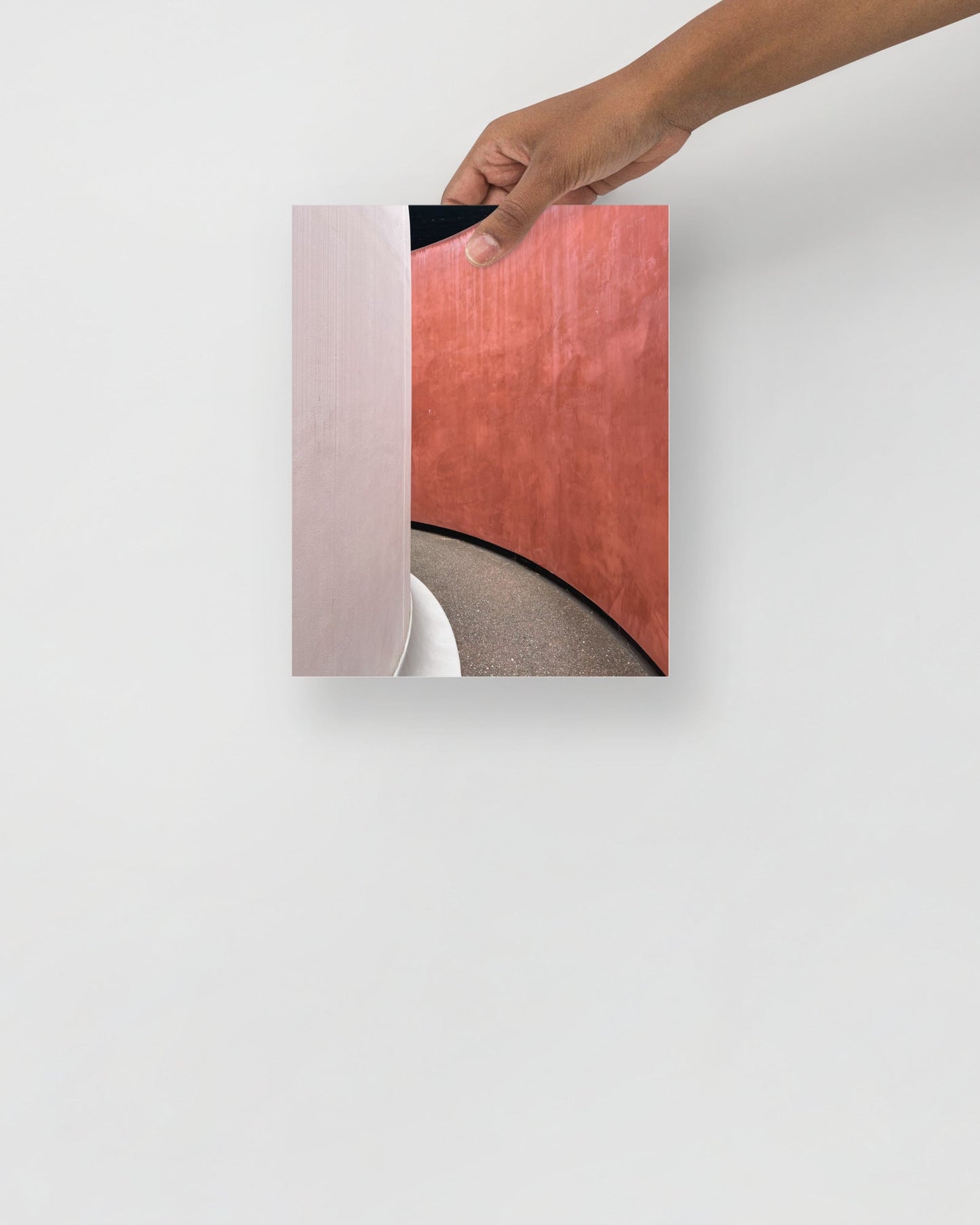 Abstract photography print of 'Three Gems by James Turrell' with a hand holding a corner of it on a white background